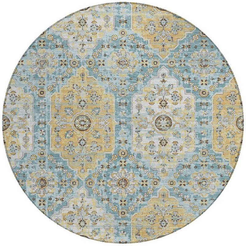 Round damask area rug with blue and gold patchwork medallions