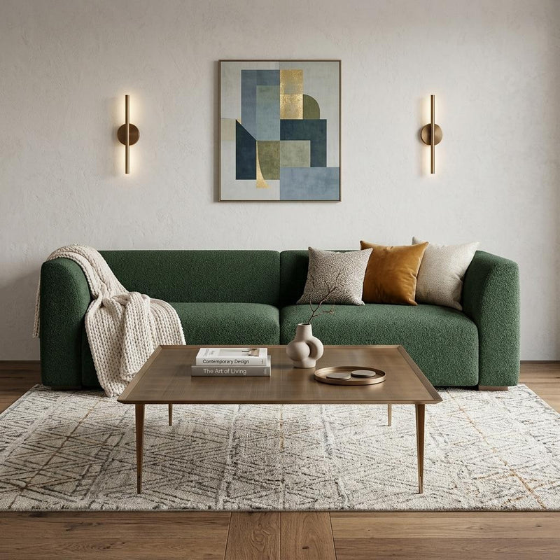 Bronze square coffee table with distressed top and four straight legs.