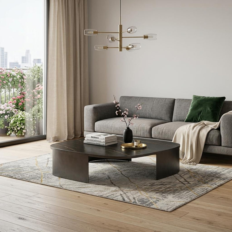 Square dark ceramic tile coffee table with steel base in living room setting, 47 in size