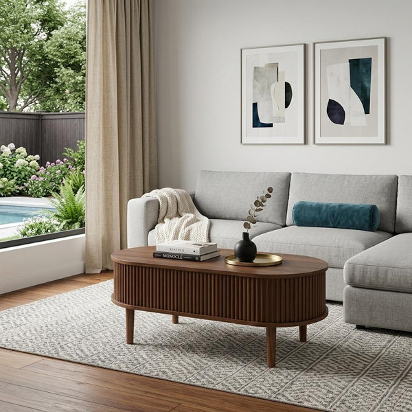 Brown wood oval lift-top coffee table with ribbed sides and tapered legs