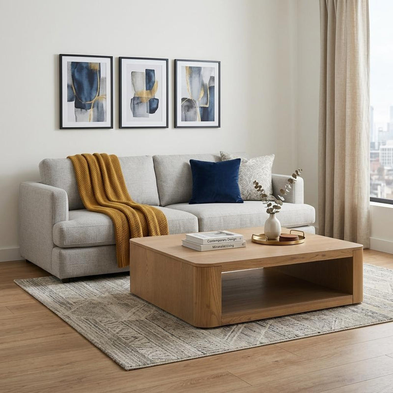 Square oak coffee table with open shelf beneath the tabletop and rounded corners