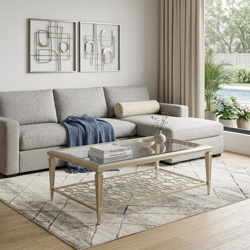 Champagne glass coffee table with geometric lower shelf, supported by four legs