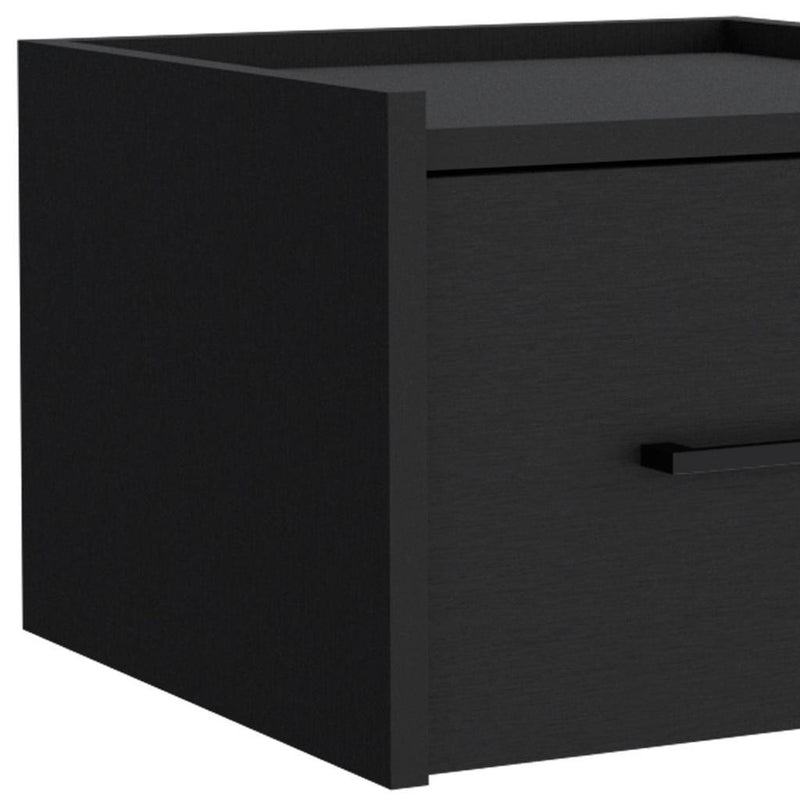 Close-up of black one-drawer nightstand with bar pull and flat top