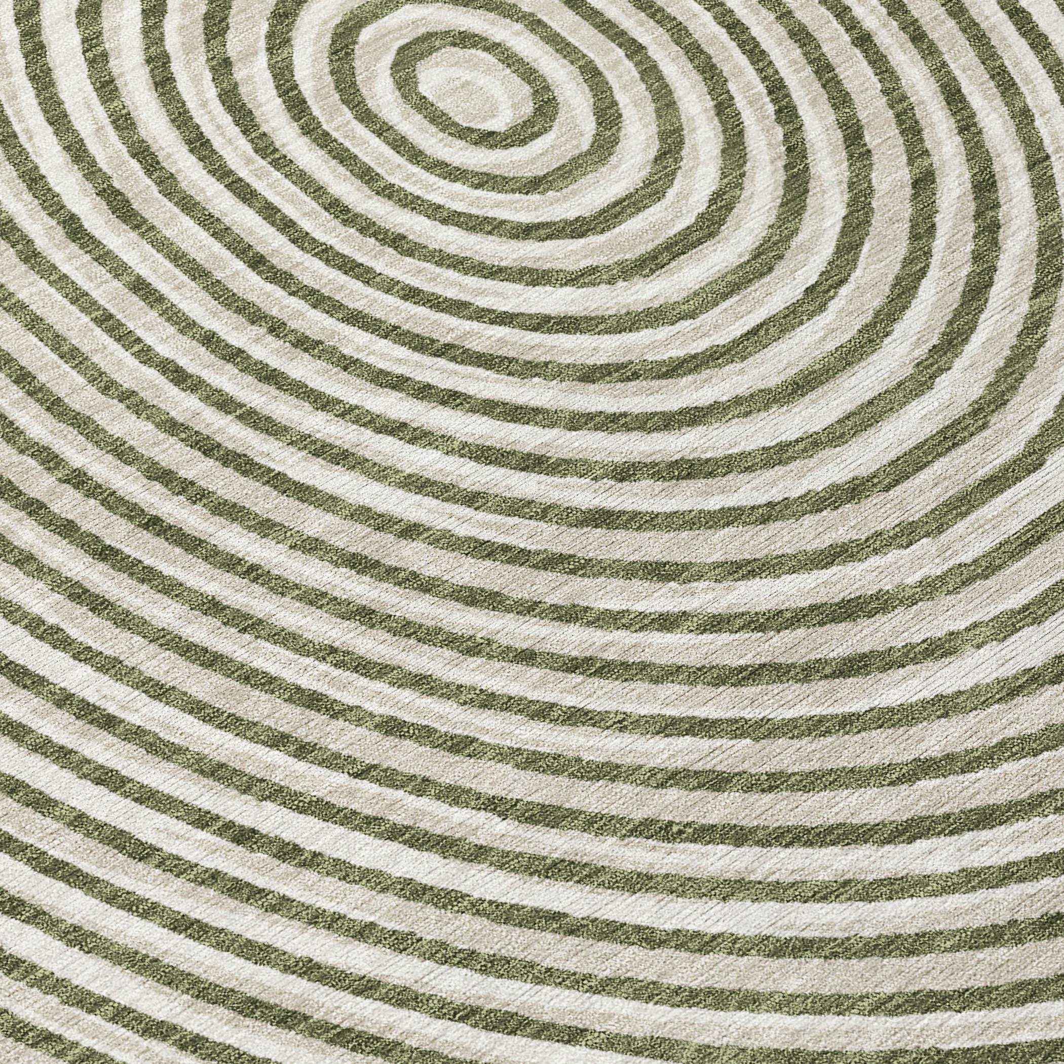 Green and white spiral patterned area rug, made of soft, woven fabric. Perfect for modern home decor.