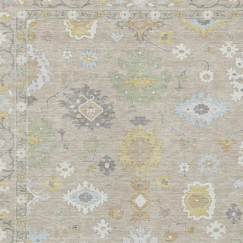 Close-up of light ivory and gray oriental rug with pale blue and yellow motif pattern