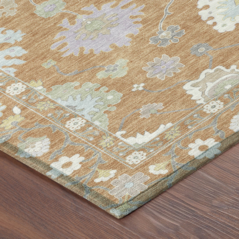 Copper and gold rug with light blue and ivory distressed floral motifs