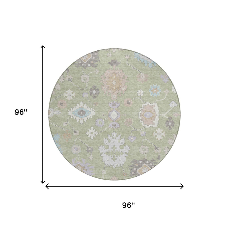 96-inch round area rug with light green base and ornate floral medallion pattern