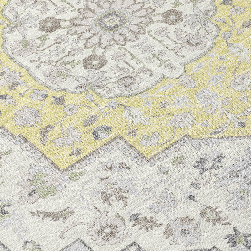 Oriental area rug corner with light gray and yellow geometric and floral motifs