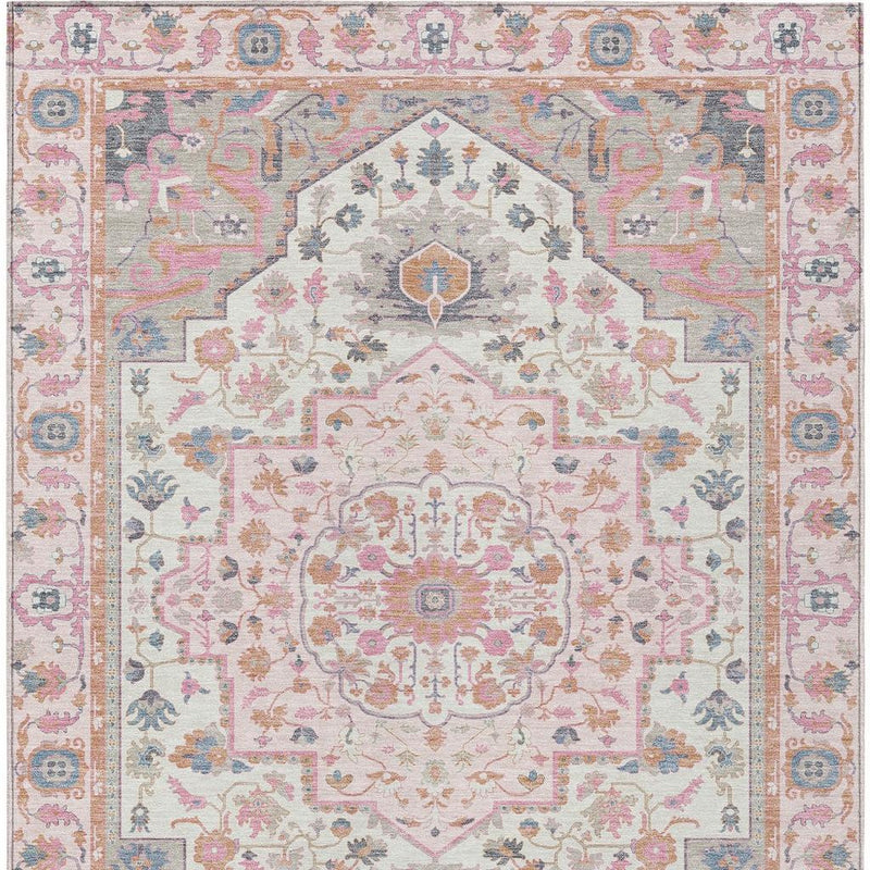 Pastel oriental area rug close view of central medallion with pink, gray, and blue accents