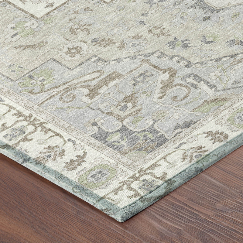 Faded ivory oriental rug corner with blue-gray field and fern green accents