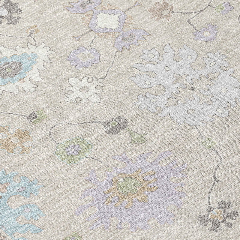 Textured close-up of distressed area rug showing woven look and scattered medallion motifs