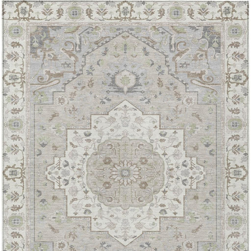 Ivory oriental area rug with central floral medallion and vine motifs, green and blue