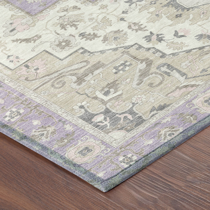 Close-up of lavender, cream, and gray oriental area rug with ornate scroll border