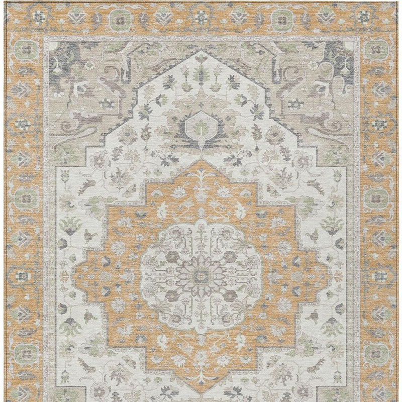 Oriental area rug with peach and gold center medallion, light gray border on cream