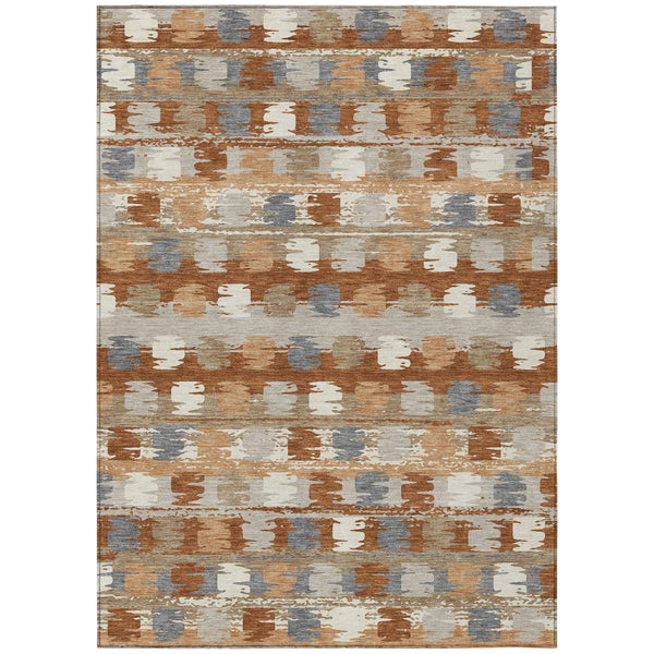 Abstract area rug with orange, beige, and gray distressed block pattern.