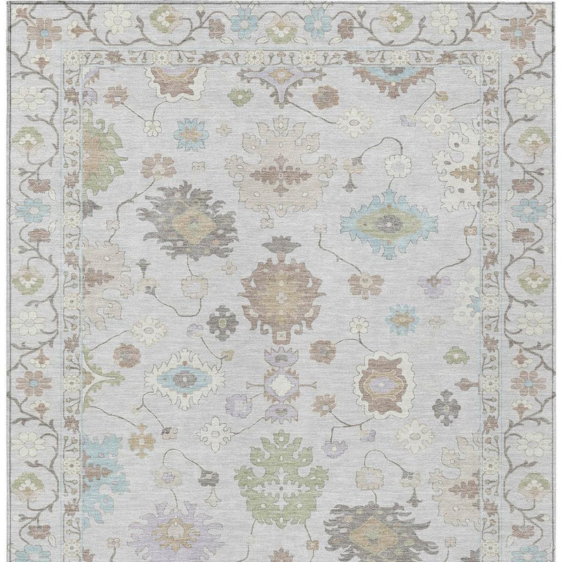 Gray indoor outdoor rug with multicolor floral medallions and ornament border frame.