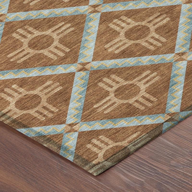 Geometric area rug close-up: brown squares with light blue diamond accents and zigzag trim