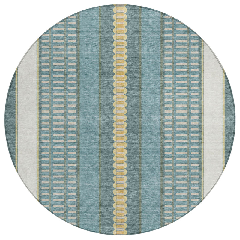 Round area rug with teal blue vertical stripes, gold center medallion, and cream borders