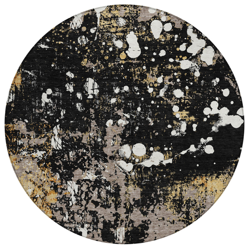 Round abstract area rug with black background, white dots, and gold distressed accents