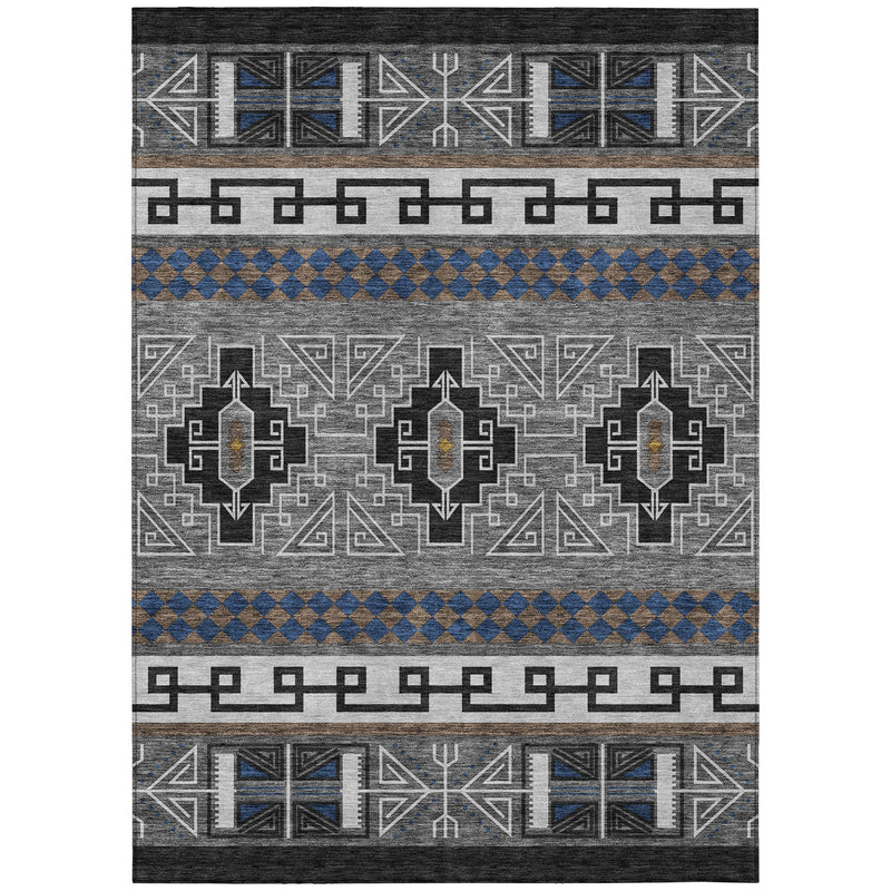 Rectangular tribal area rug with repeating medallions, gray and black tones, and blue bands