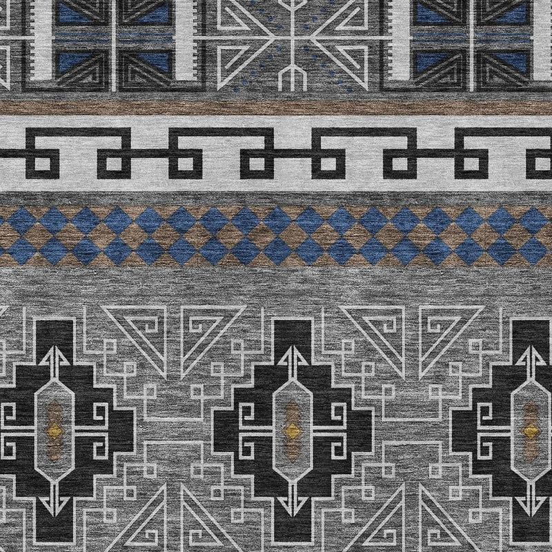 Tribal rug close-up with geometric motifs, gray base, and blue diamond stripe border