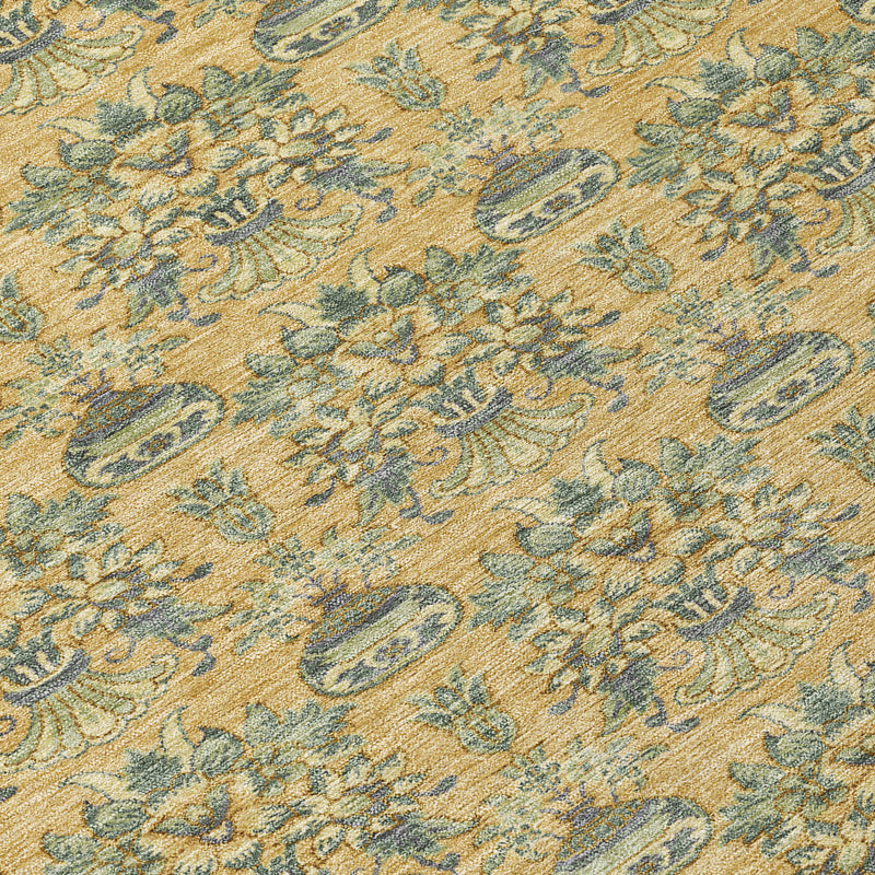 Close-up of textured gold and teal floral medallion rug pattern