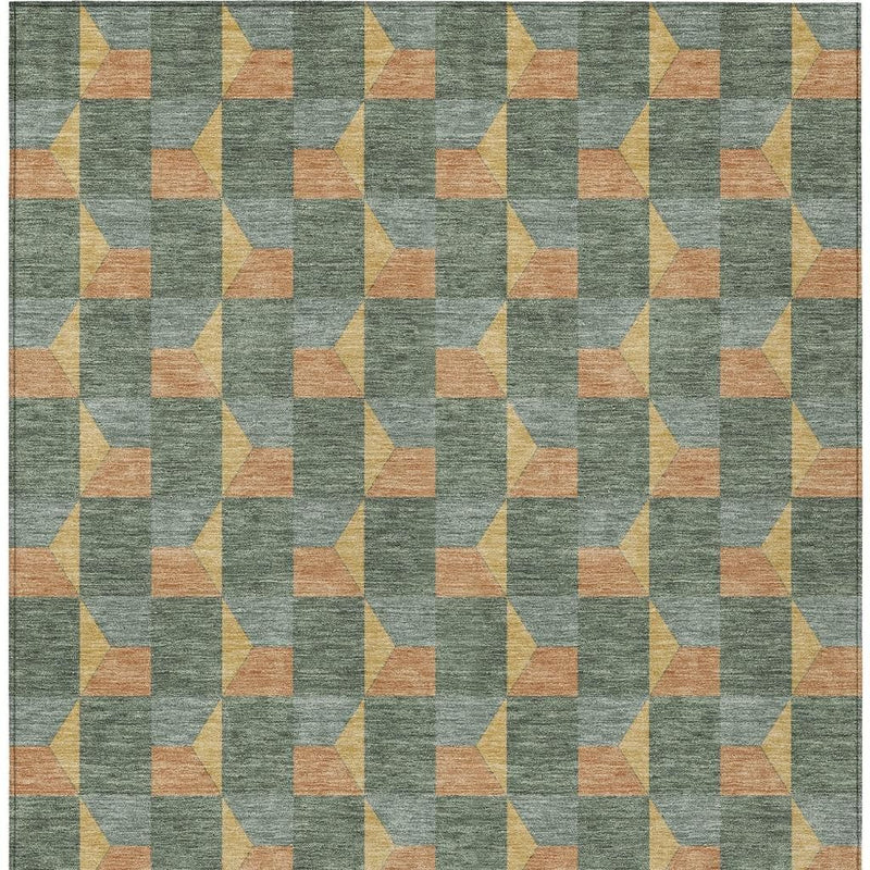 Pattern view of green-gray washable rug with tan-orange cube blocks and yellow accents