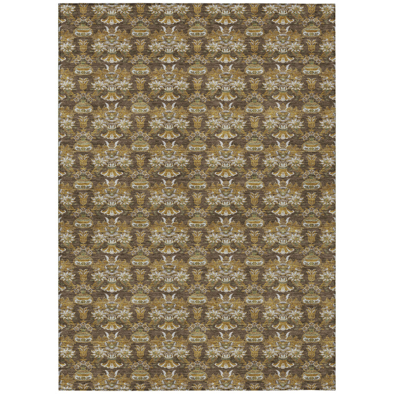 Floral patterned area rug with repeating damask motifs in brown, gold, and cream