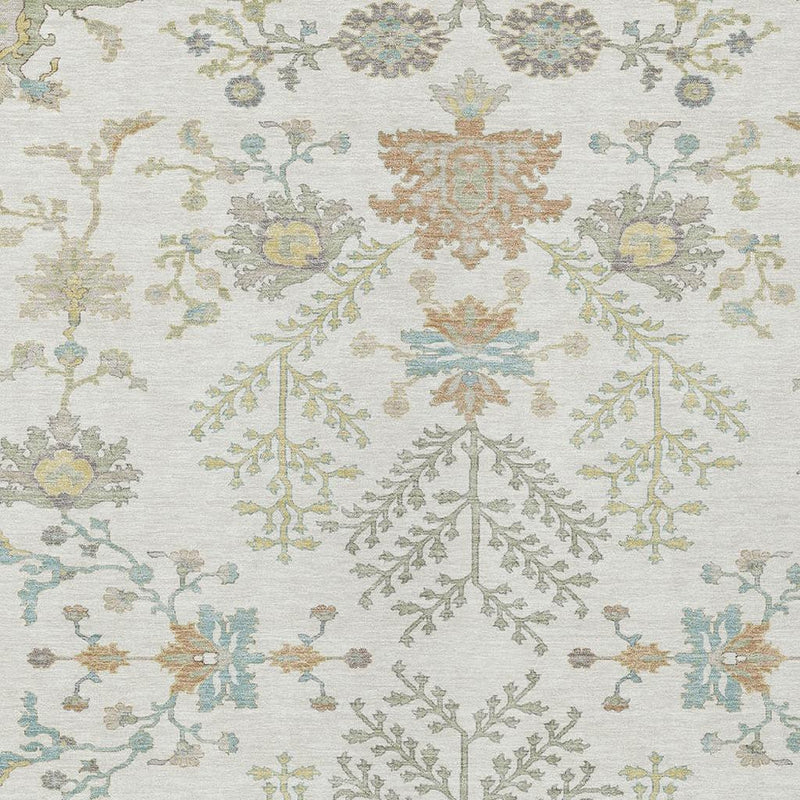Ivory oriental area rug with centered medallion and scrolling floral details in blue and tan