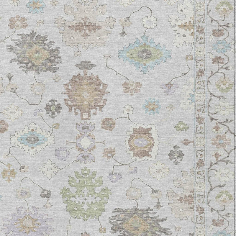 Top view of a light ivory rug featuring pastel medallions, flowers, and decorative border