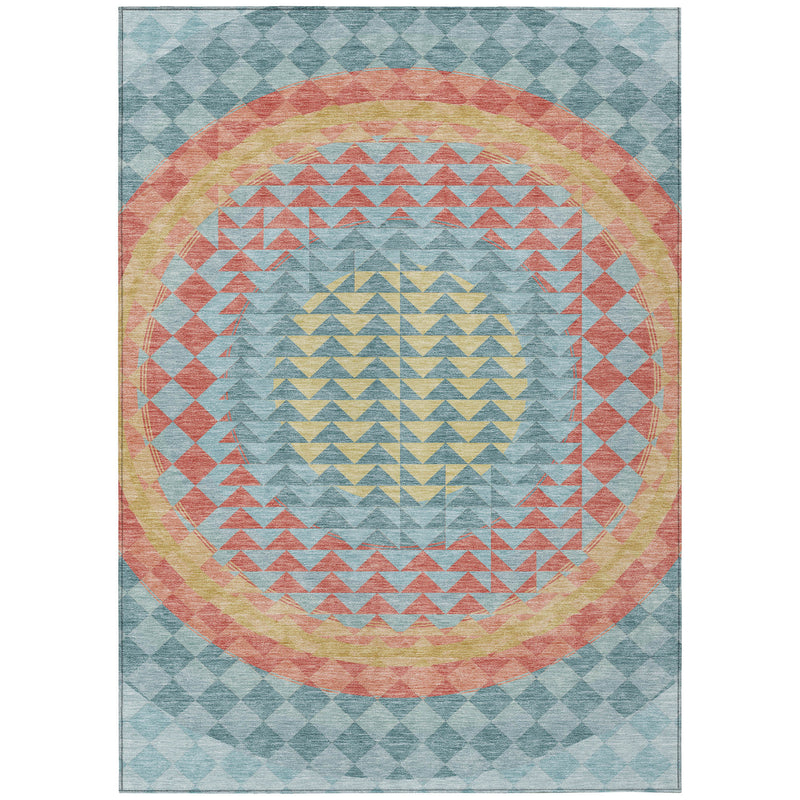 Teal blue geometric area rug with centered circular medallion and chevron border