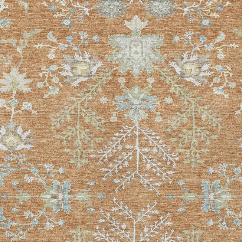 Copper-brown oriental rug detail with ivory, pale blue, and mint floral motifs