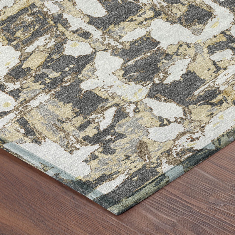 Rectangular abstract rug with distressed graphite gray and ivory pattern, corner view