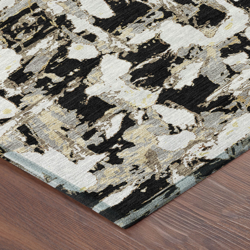 Abstract rug corner detail with black and copper pattern on cream, textured weave.