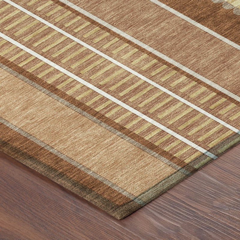 Corner view of striped area rug with orange-brown, gray, cream, and white lines