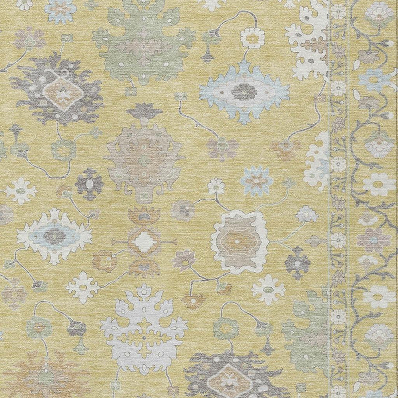Close-up of wheat yellow rug with ivory and blue-gray geometric floral medallions