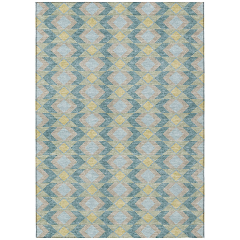 Geometric area rug with teal blue, gray, cream, and yellow interlocking zigzags