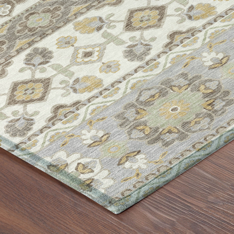 Corner detail of ivory and silver tribal area rug with patterned edge