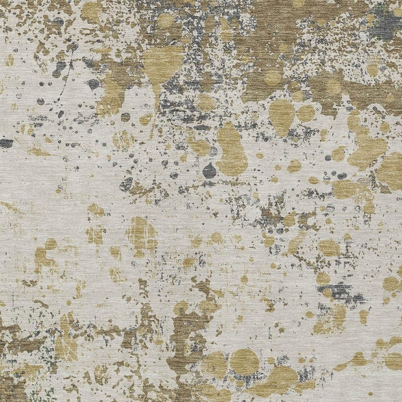 Close-up of ivory abstract rug with tan, olive, and gray distressed blotches