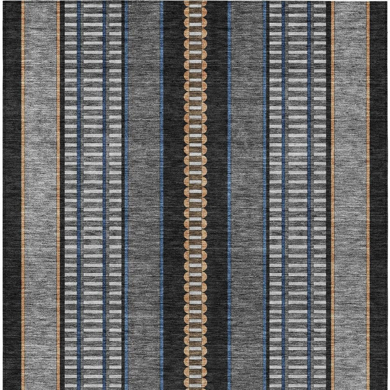 Striped area rug with vertical bands in gray, blue, copper, white, and black