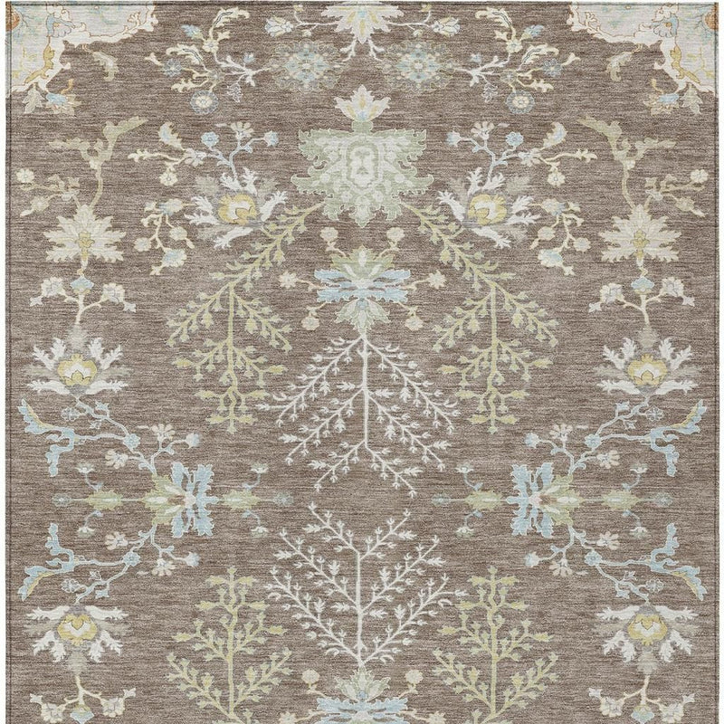Taupe oriental area rug with ivory botanical medallion, light blue and yellow highlights