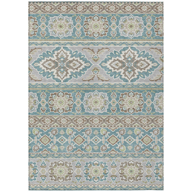 Rectangular teal and green tribal wash area rug with repeating border medallions