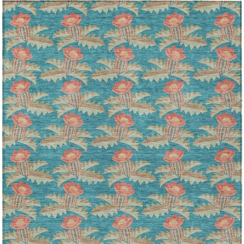 Turquoise floral area rug, coral blossoms repeat pattern, flat lay