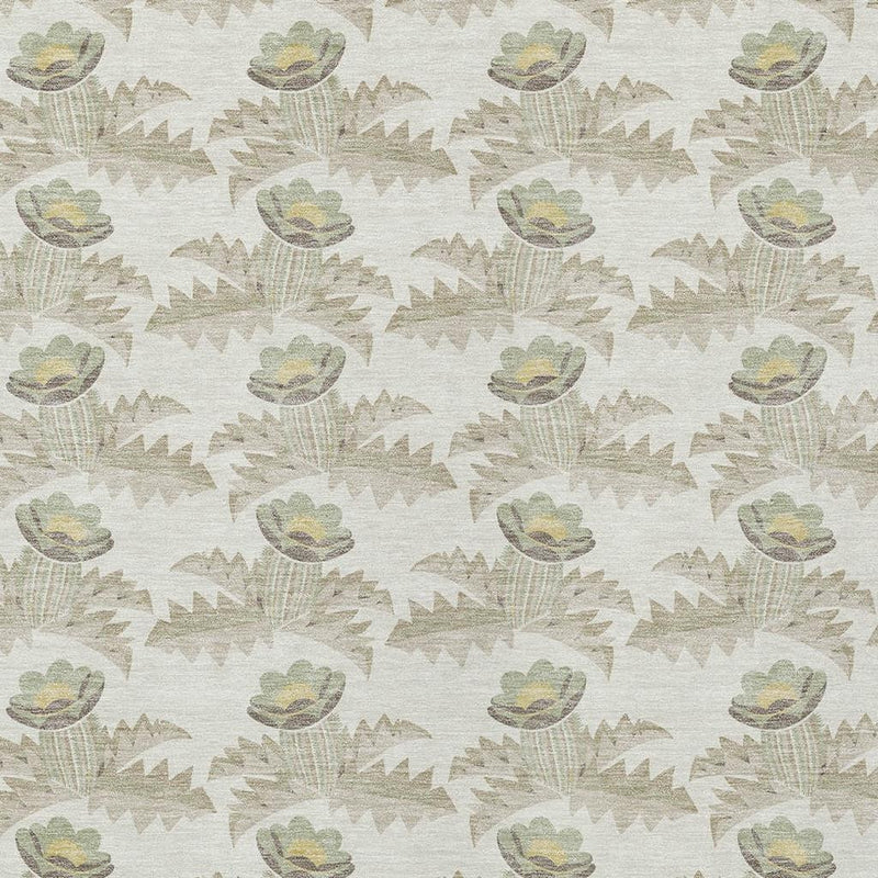 Ivory area rug close-up with oval floral medallions and small zigzag leaf texture