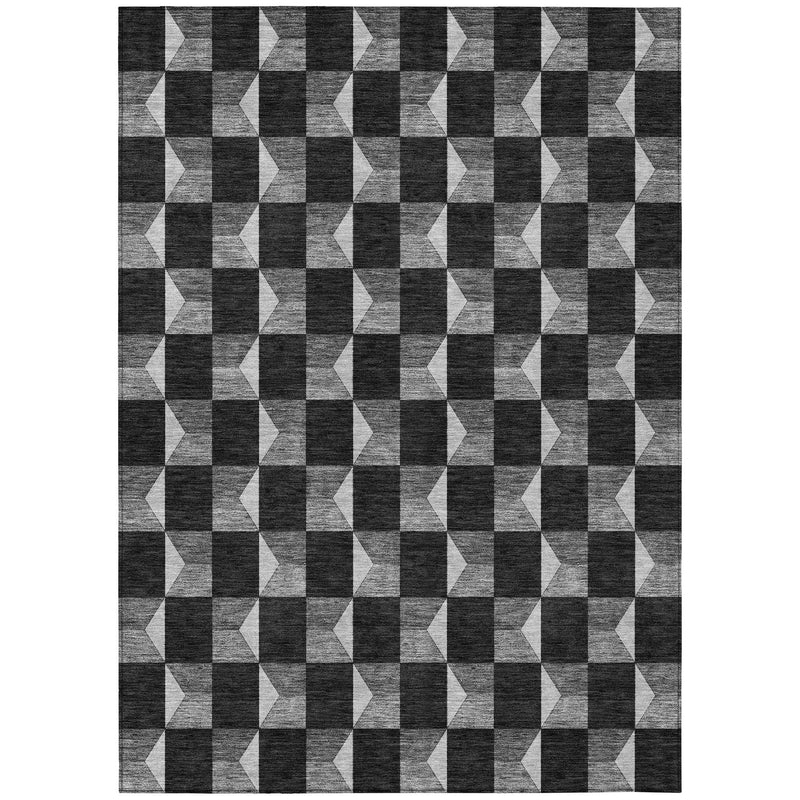 Full view rectangular geometric area rug in black and ivory check-and-knot pattern