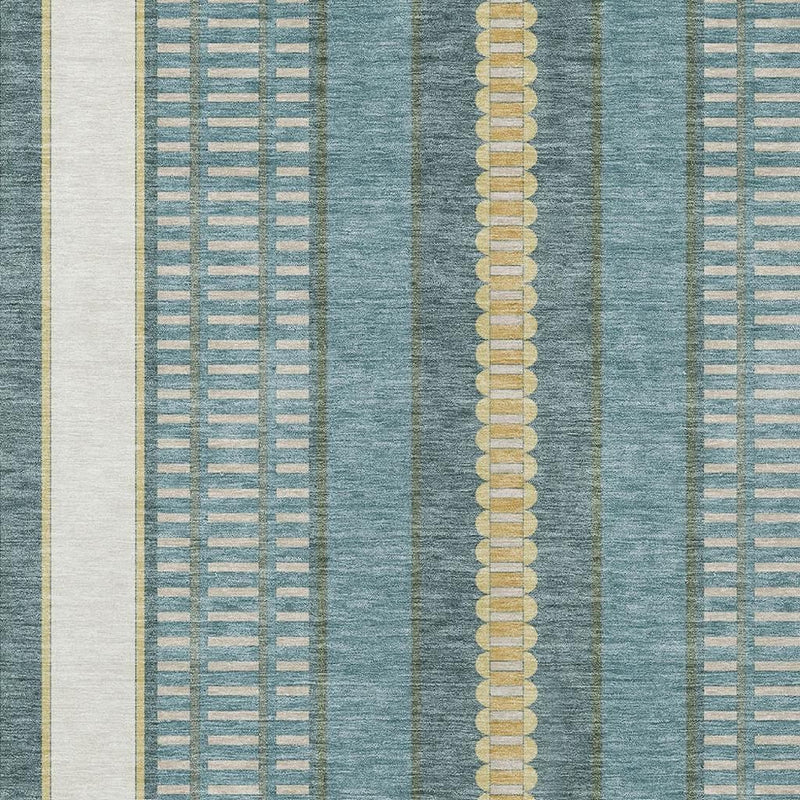 Teal blue area rug close-up with beige-gold center stripe and vertical rectangular motifs