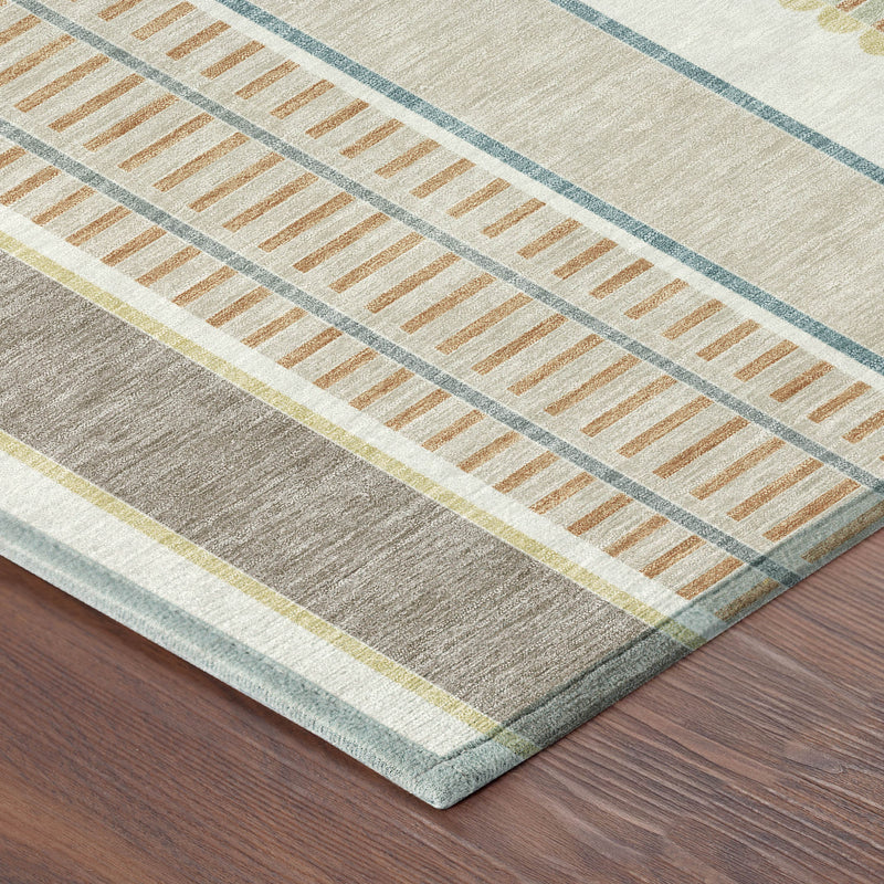 Corner view of ivory and teal striped washable area rug with border and textured pile
