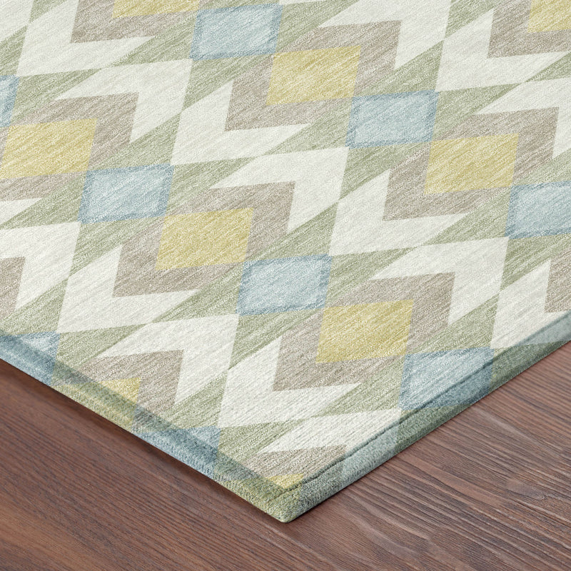 Corner view of ivory area rug with multicolor geometric diamond chevron pattern