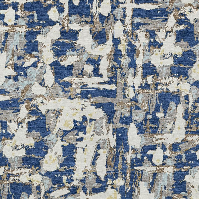 Close-up navy and beige abstract rug pattern with distressed overlapping paint marks