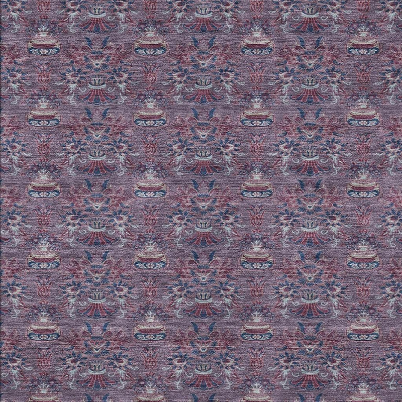 Plum and gray area rug with repeating ornate floral medallion motifs.